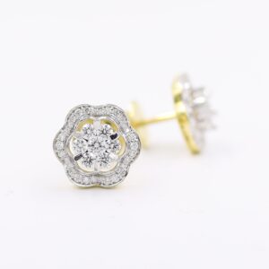 14kt Ethereal Floral Earrings topped with a round pressure-set diamond.