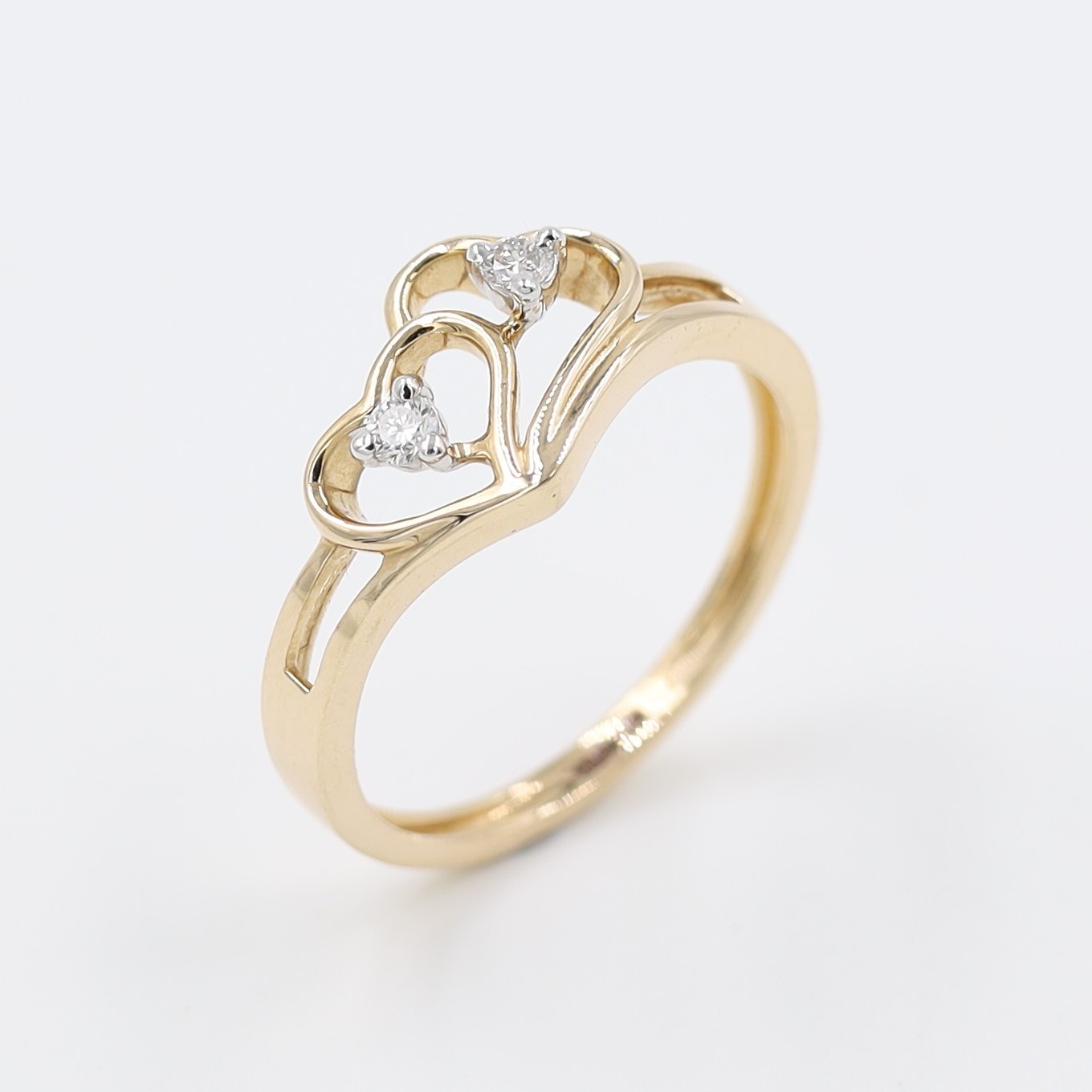 14Kt Rose Gold Ring In Shape Of Hearts With Two Diamond on It