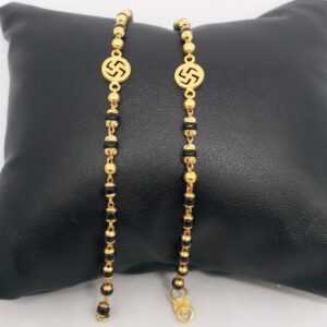 22 kt 916 Hallmark gold black beats kids fancy swastik najriya