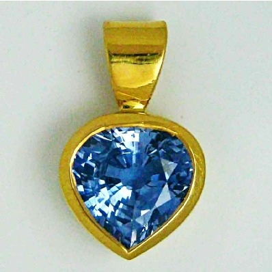 Gold with paan shape blue diamond pendant