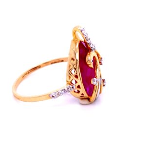 Mesmerizing peacock diamond ring in 14ktwith pink colored stone