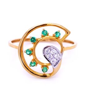 Fancy gold ring with natural diamond and colored stones.