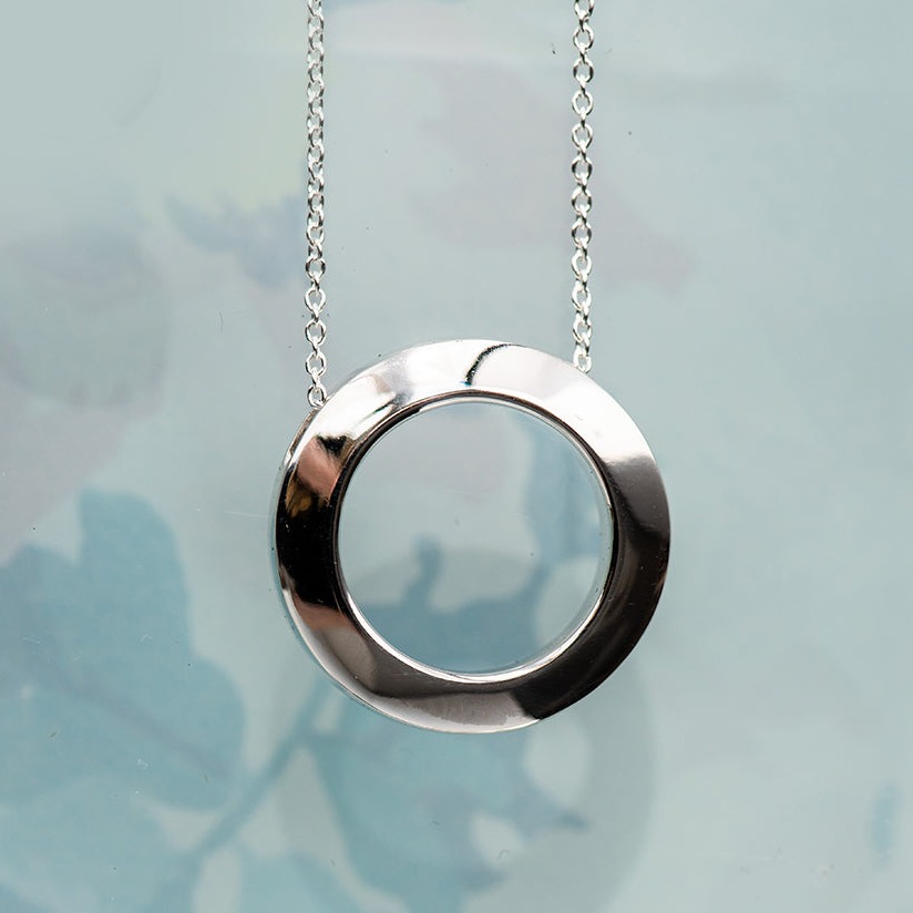 Silver circle of love pendant