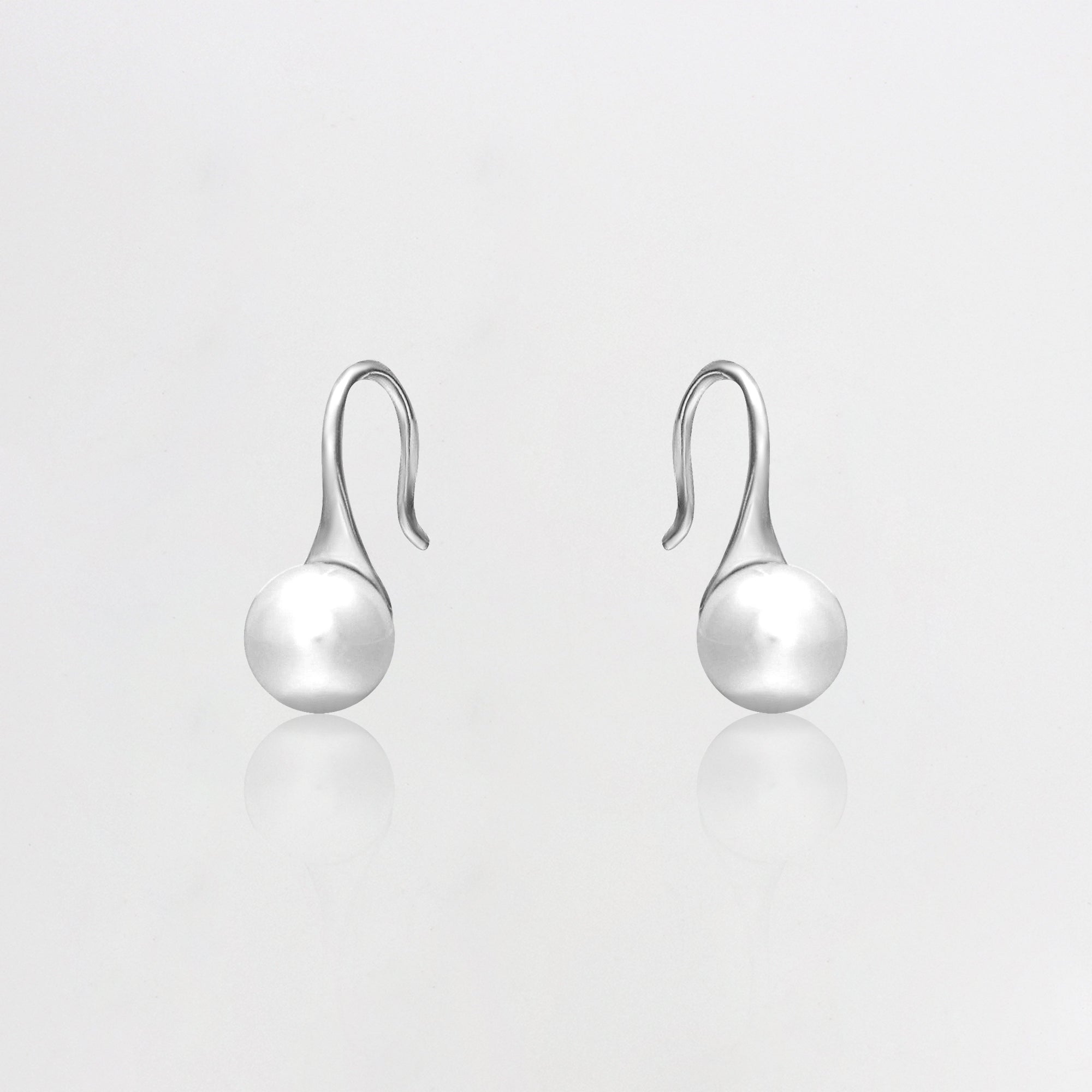 Silver pearl tiny stud earrings - Image 4