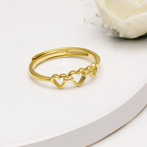 Golden triple heart ring