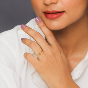Golden triple heart ring