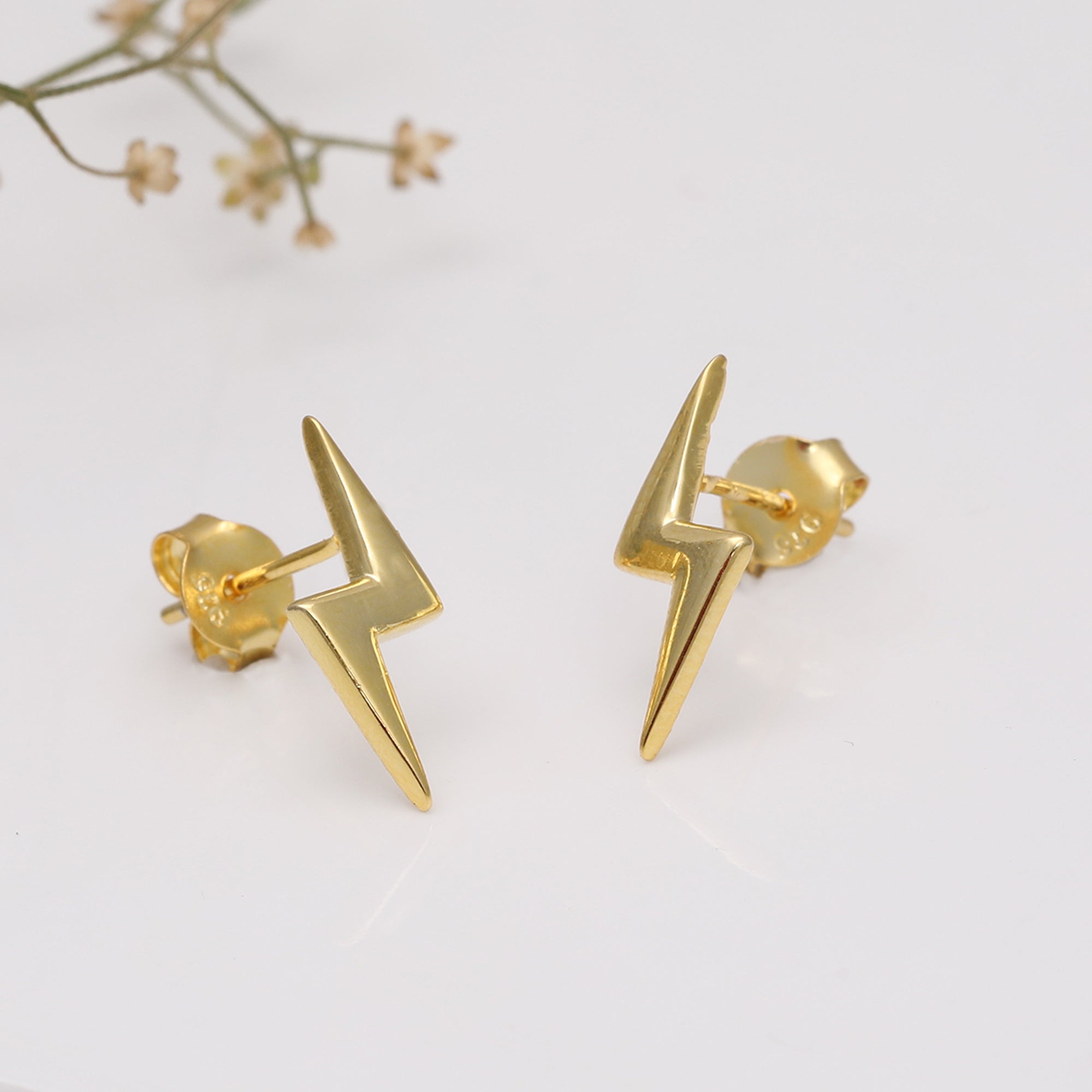 Golden lightning bolt stud earrings - Image 4