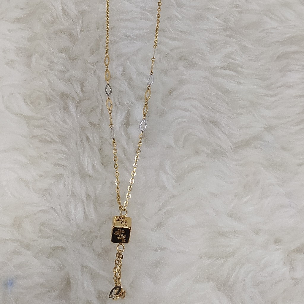 18kt Gold Fancy Tanmaniya