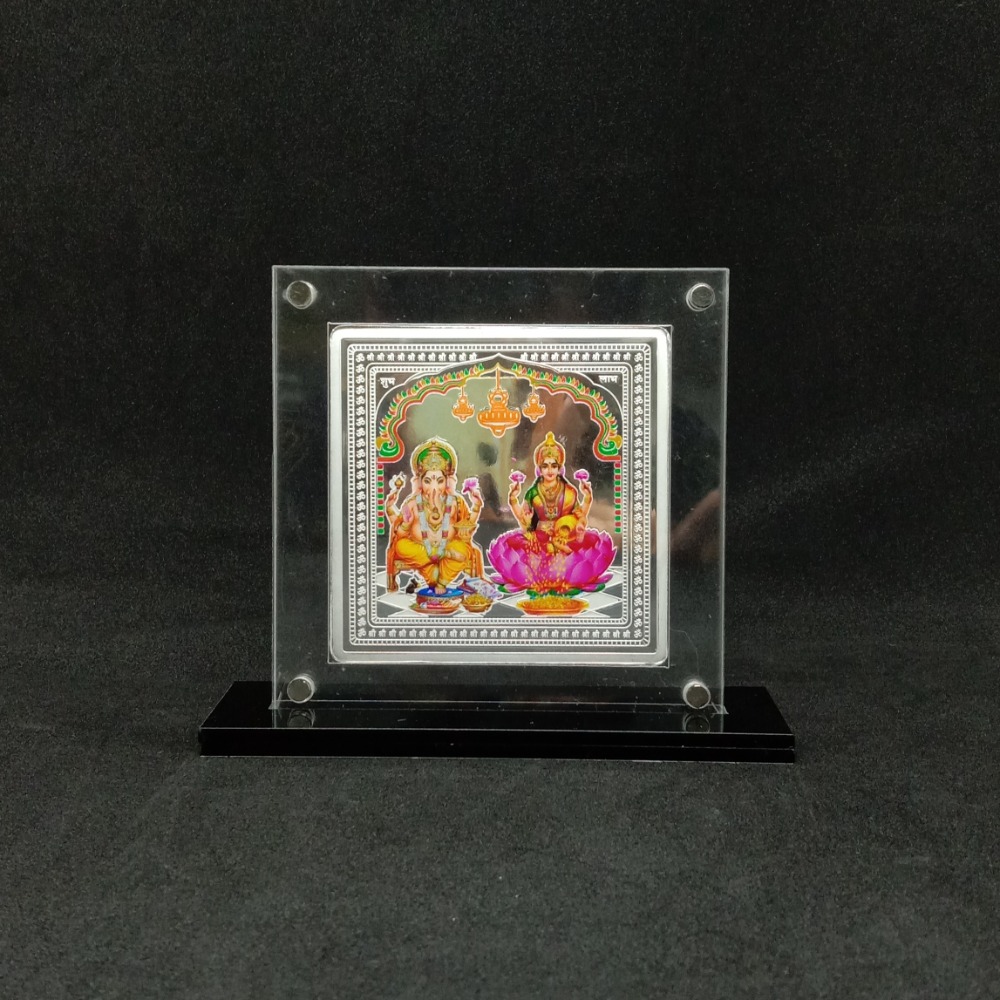 Hallmarked silver designer coin of laxmi ganesh in color printing