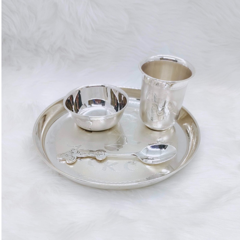 Hallmarked silver baby mickey set in fine carving by puran