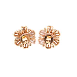 Floral tops with pressure set & baguettes in hallmarked rose gold