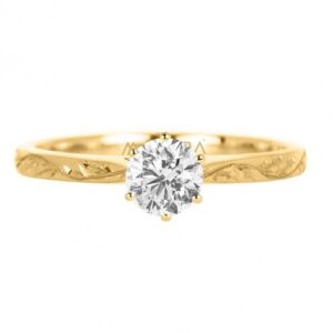 Carved solitaire ring
