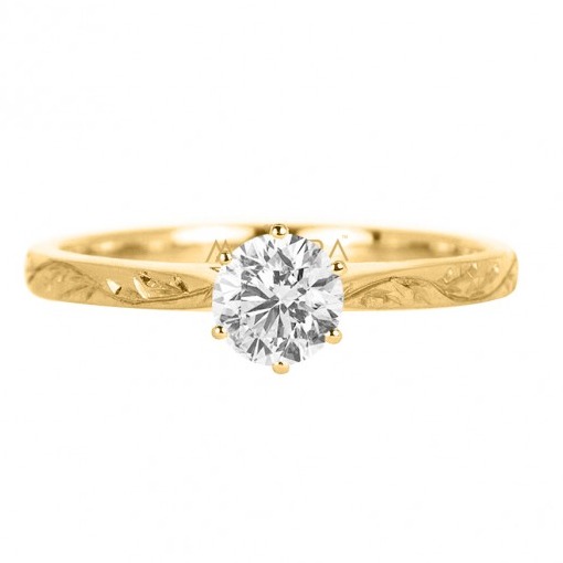 Carved solitaire ring