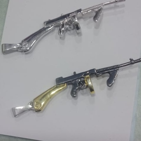 Silver gun pendant