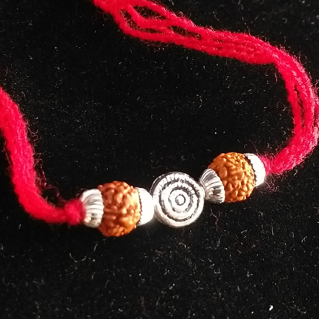 Silver Rudraksh & Fancy Brouch Rakhi - Image 2