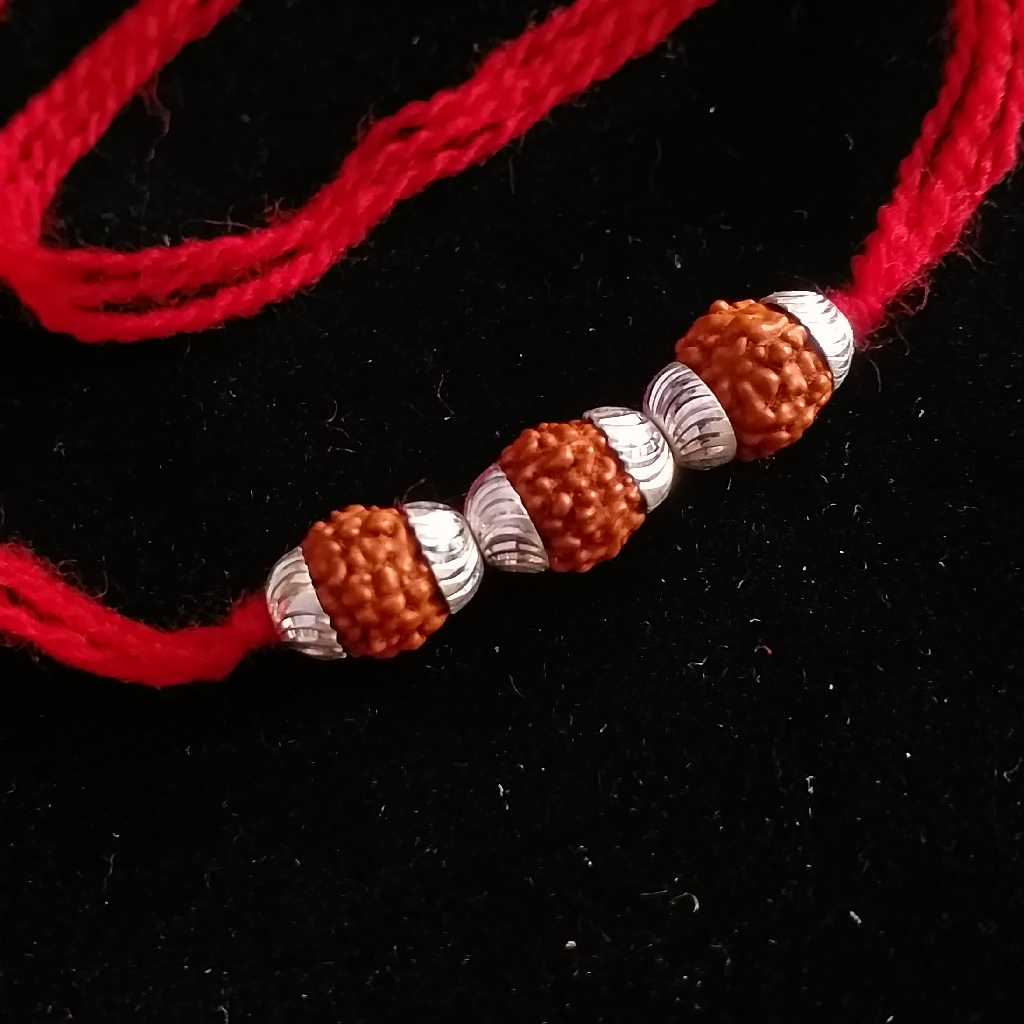 Silver Vertical three rudraksh rakhi - Image 2