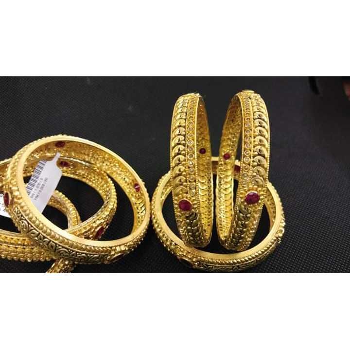 916 Gold Kangans floral pattern with ruby stones.
