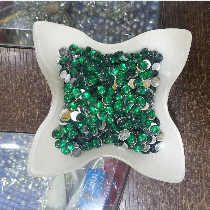 Jadtar kundan (imitation material)