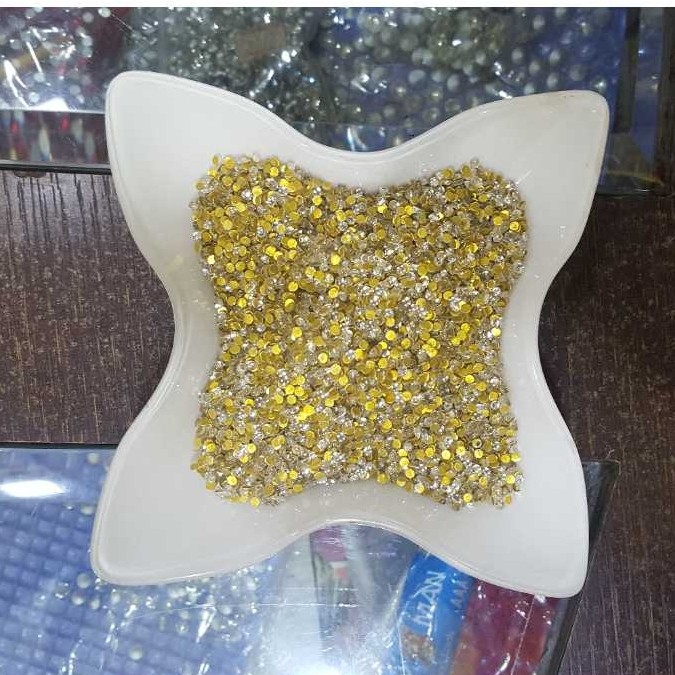 Jadtar kundan (imitation material)