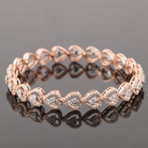18kt rose gold drop shaped diamond bangle