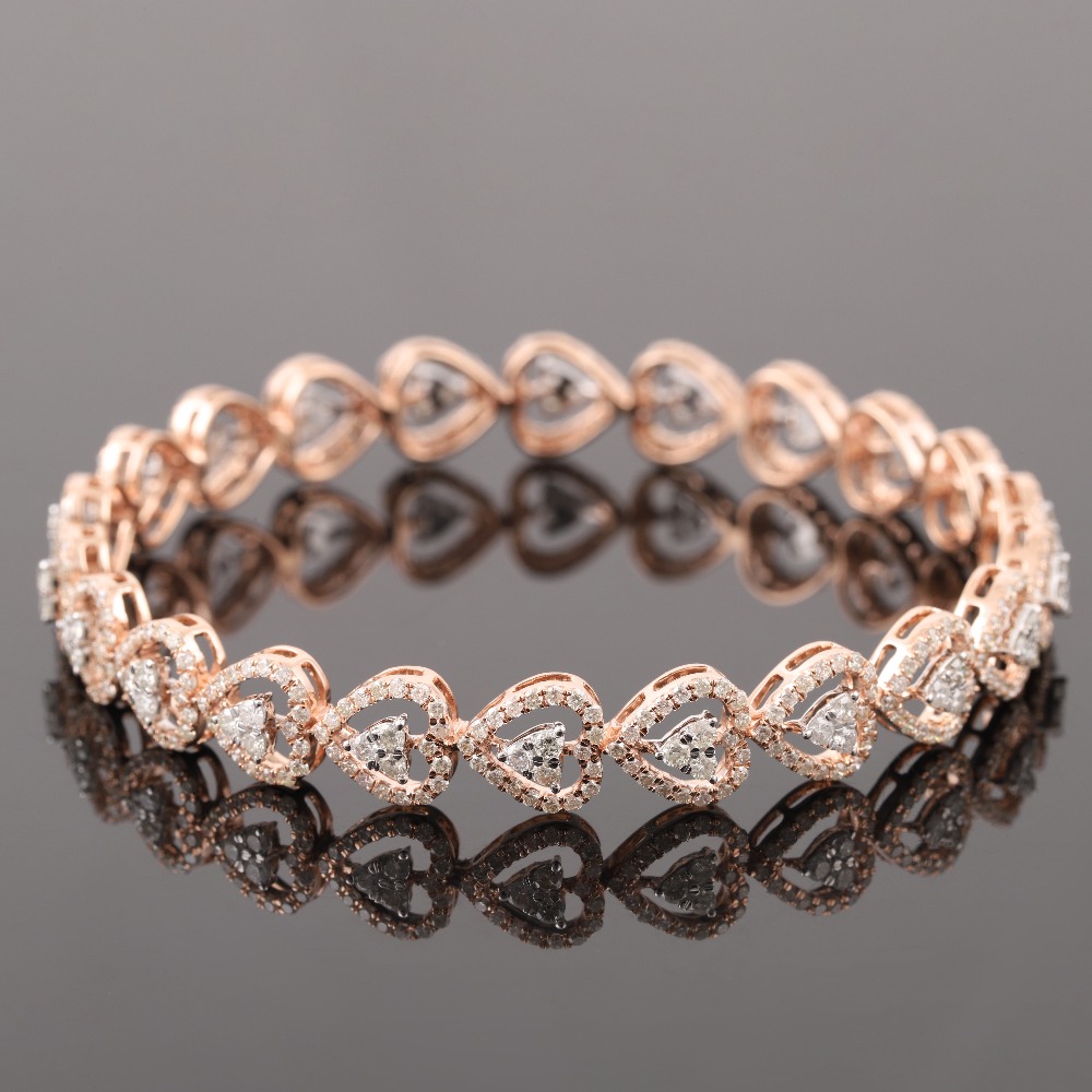 18kt rose gold drop shaped diamond bangle