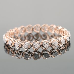 18kt rose gold designer diamond bangle