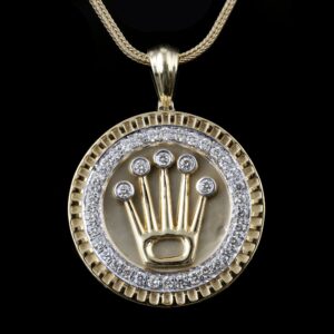 18kt rolex shaped diamond pendant