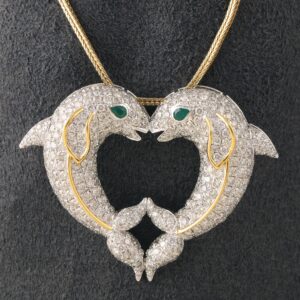 18kt dolphin shaped diamond pendant