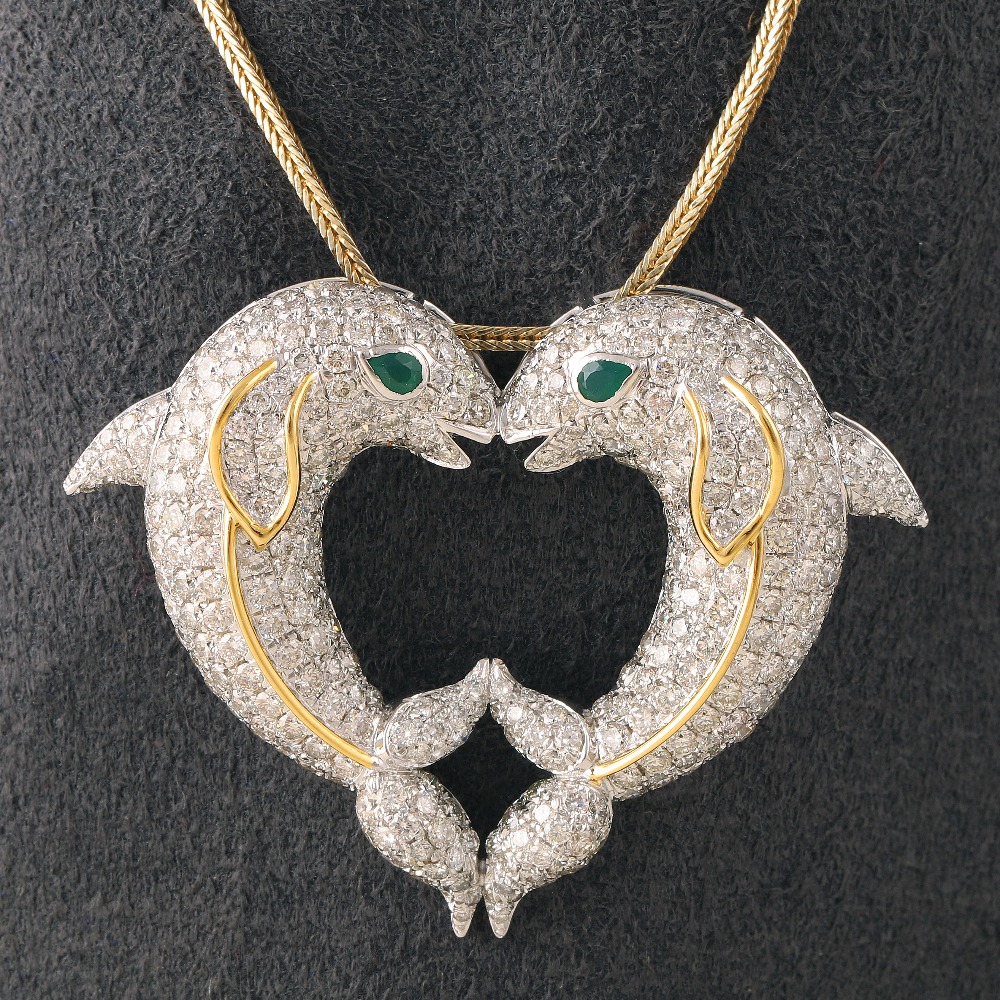 18kt dolphin shaped diamond pendant