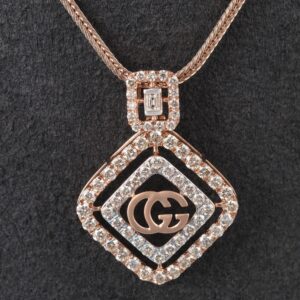 18kt gucci shaped diamond pendant