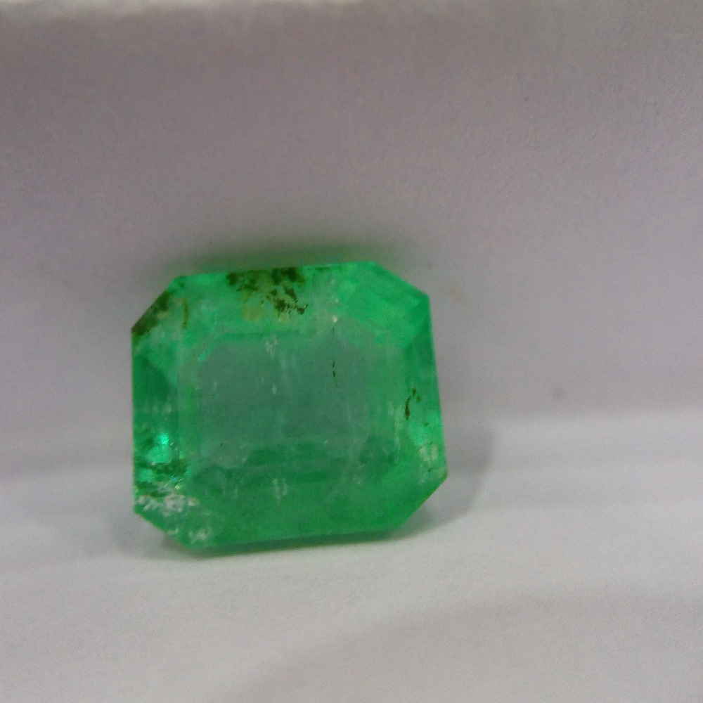 3.65ct emerald-cut green emerald-panna