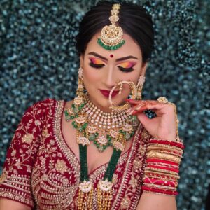 Gold plated pink pachhi kundan with green beads necklace