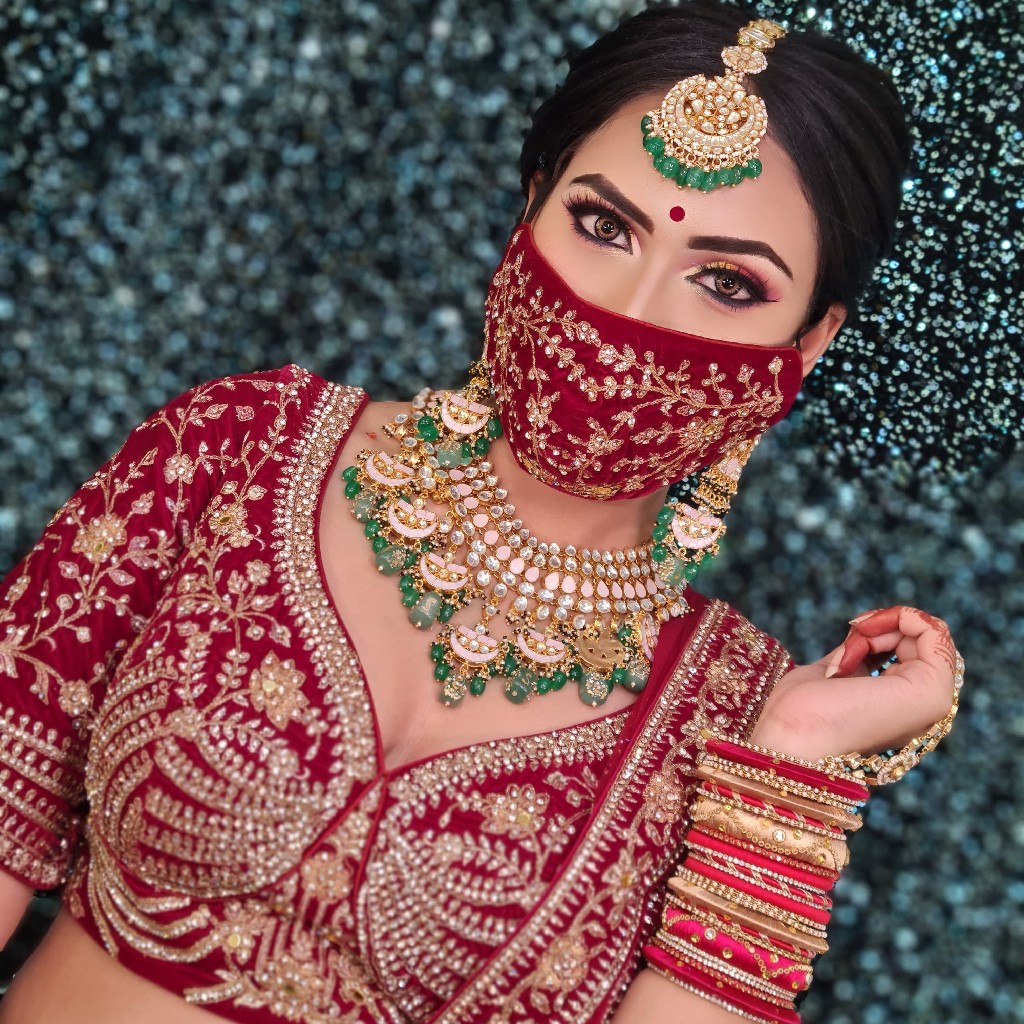 Gold plated pink pachhi kundan with green beads necklace