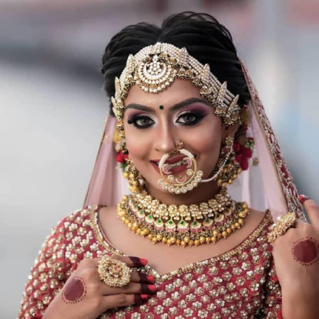 Pachhi kundan nackless with earrings and headaccessories