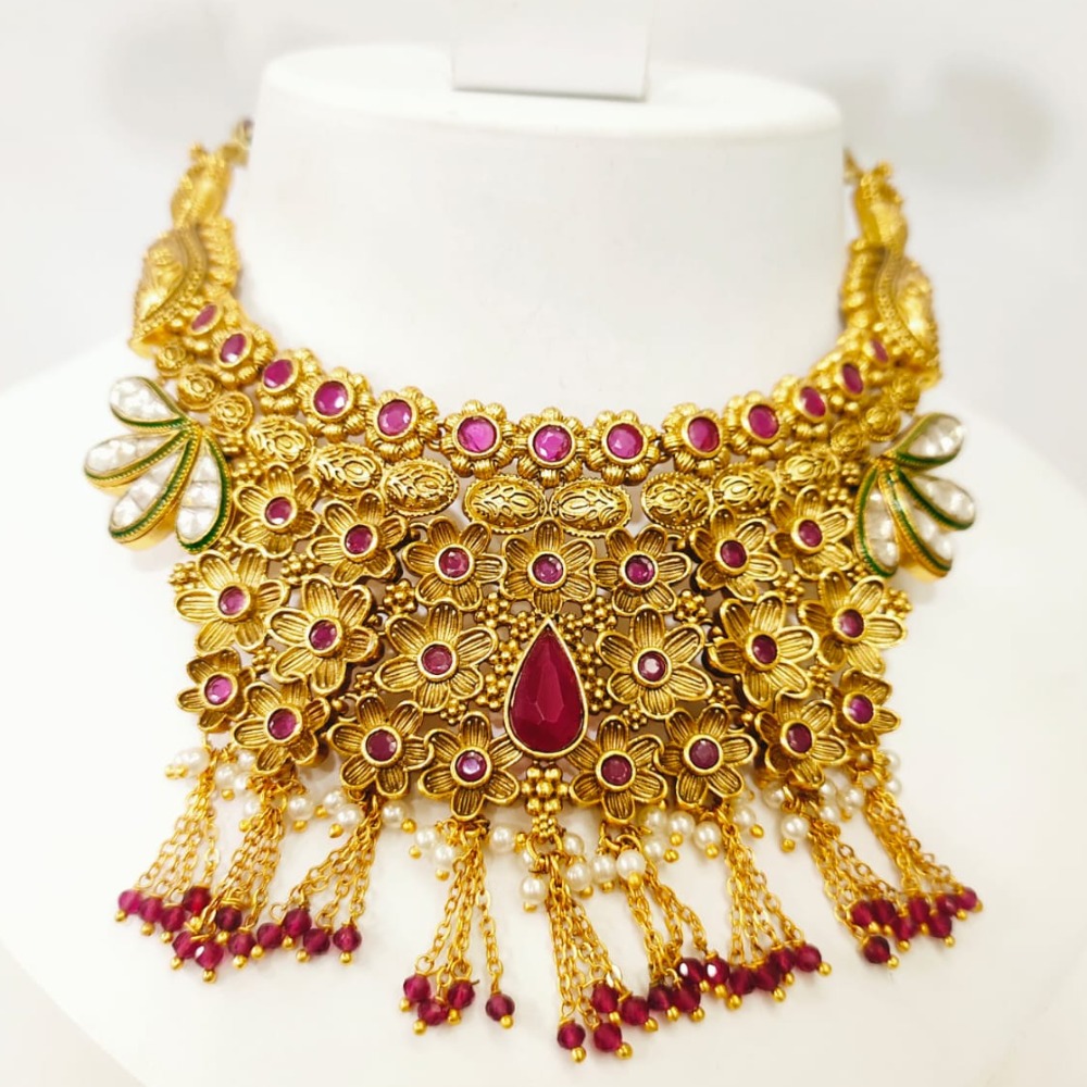 Full antique with hanging string and gold plated middle ruby stone 1398