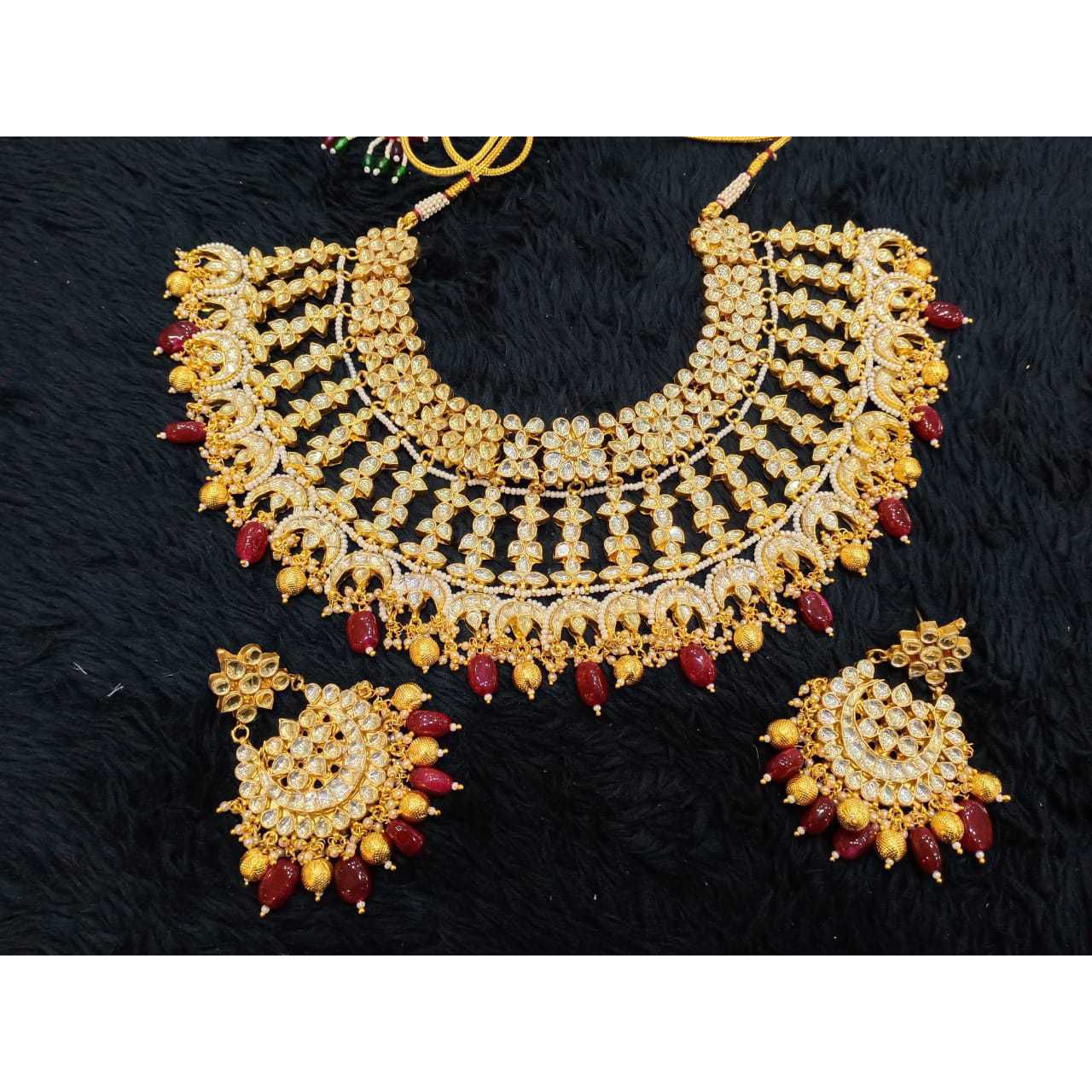 Beautiful white kundan and maroon and golden 1103