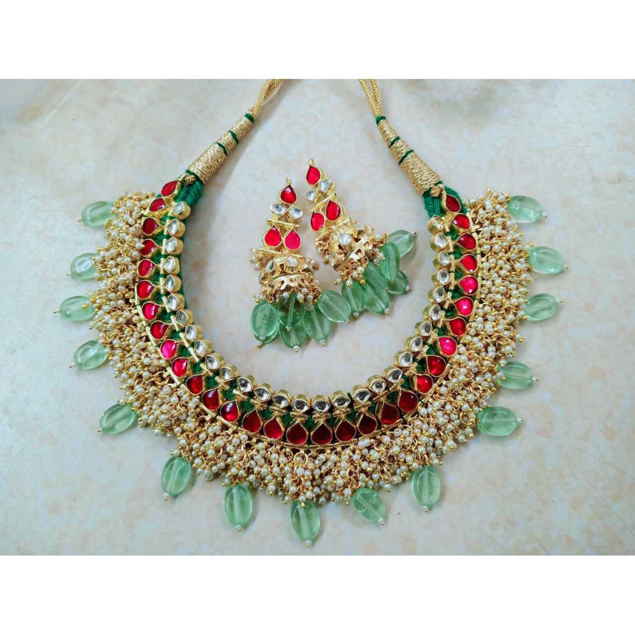 Pink and green kundan gaadi set with beautiful earrings1086