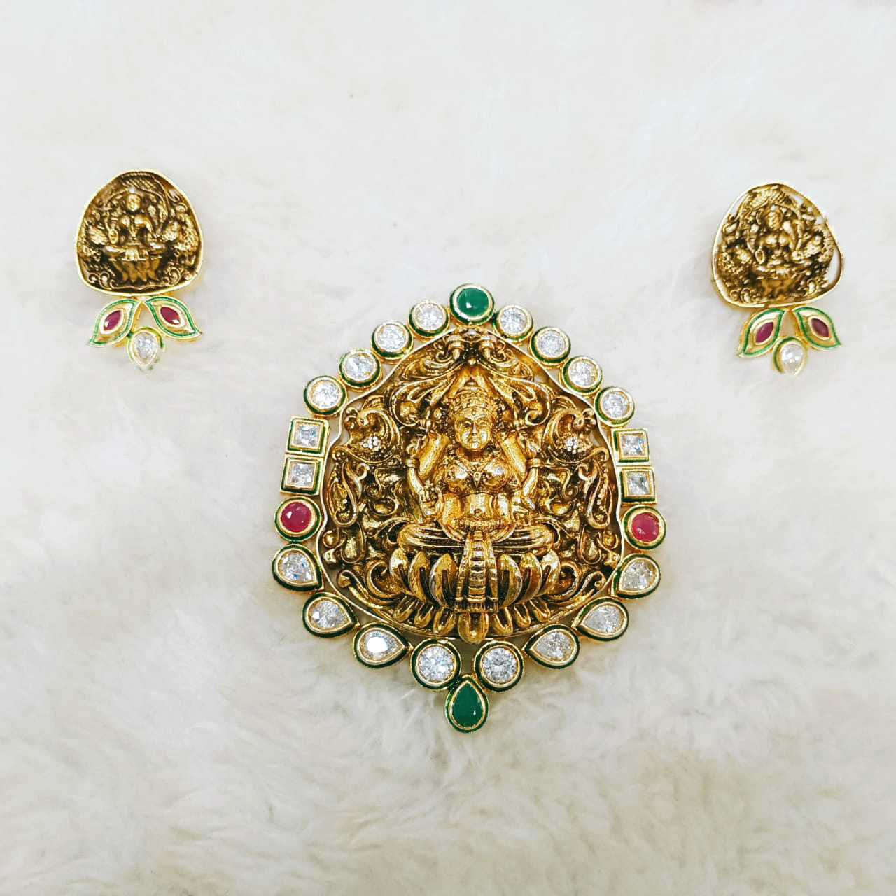 Geru polished golden antique temple pendant and earring set with bikaneri kundan combination of antique design  1066