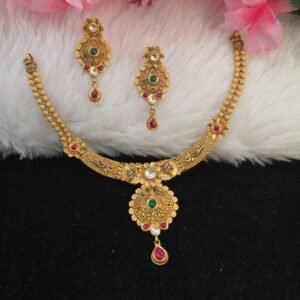 22k gold fancy antique jadtar red and green colour stone short set