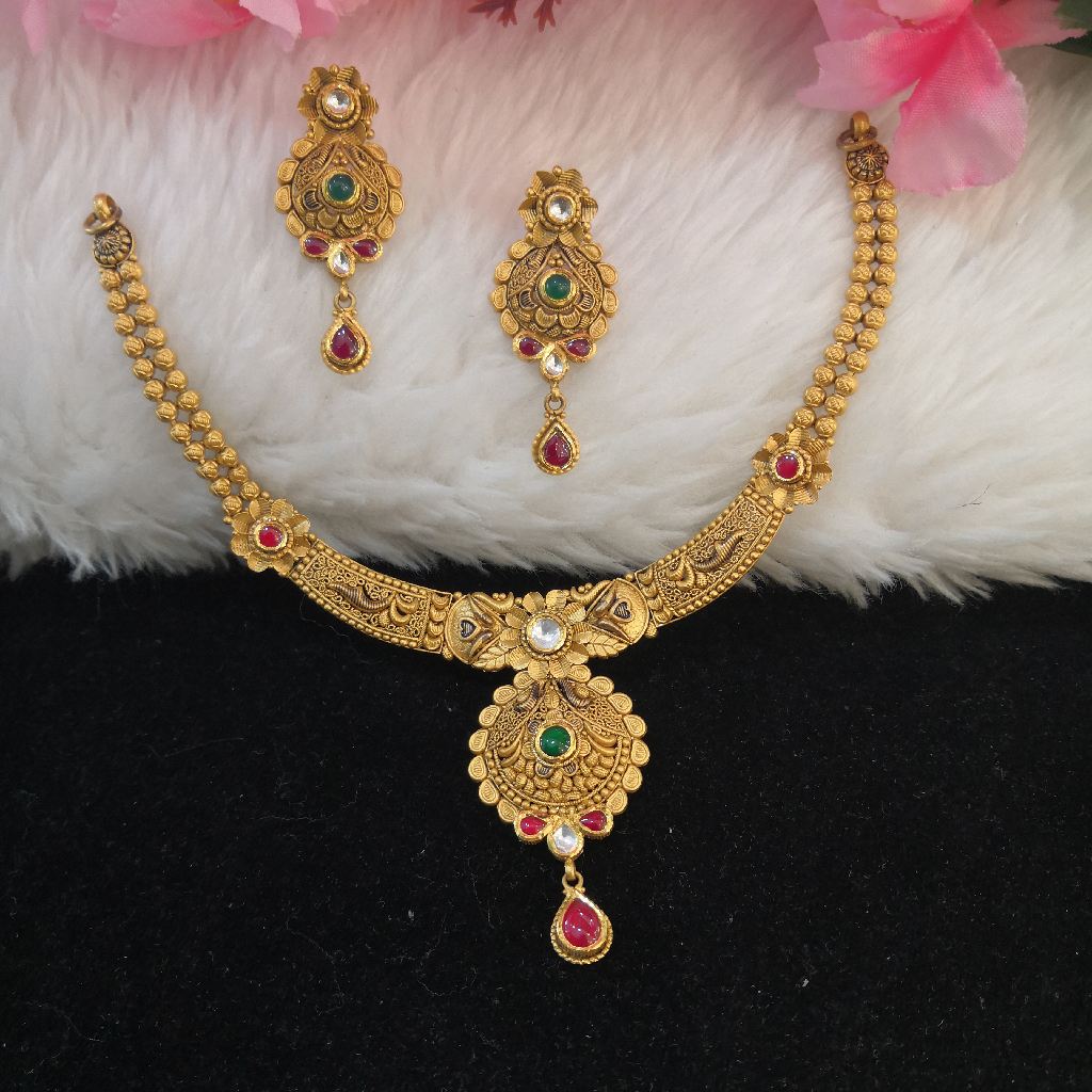 22k gold fancy antique jadtar red and green colour stone short set
