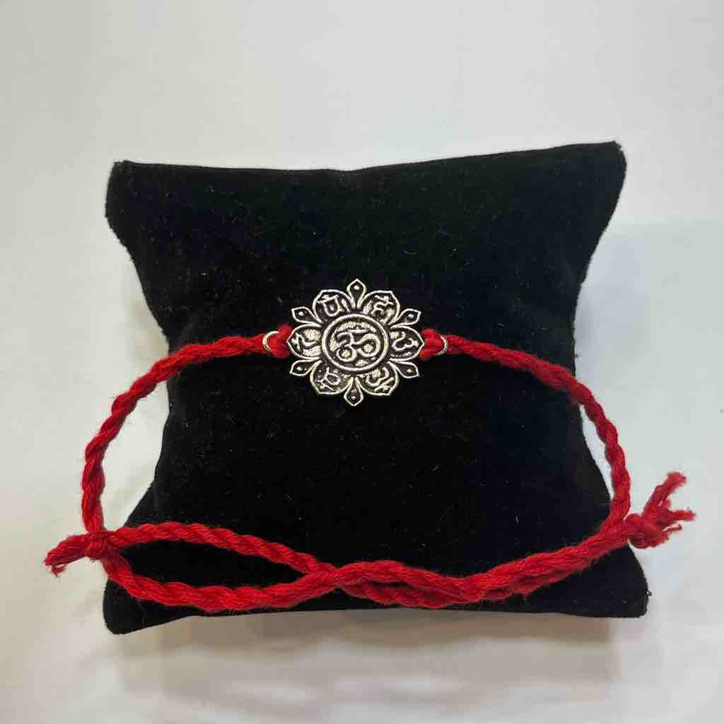 925 silver om design rakhi