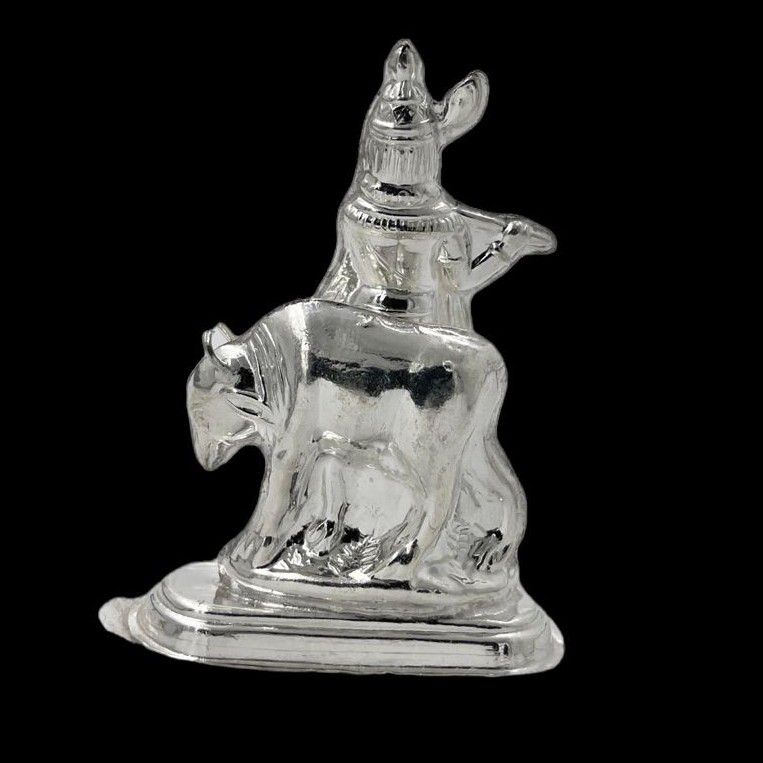 Silver design in krishana and cow idol
