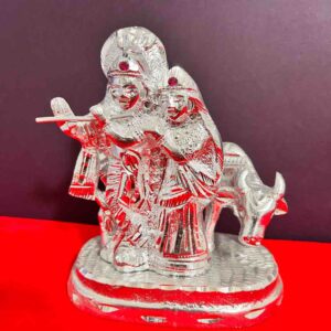 silver plated radhe Krishna and cow idol