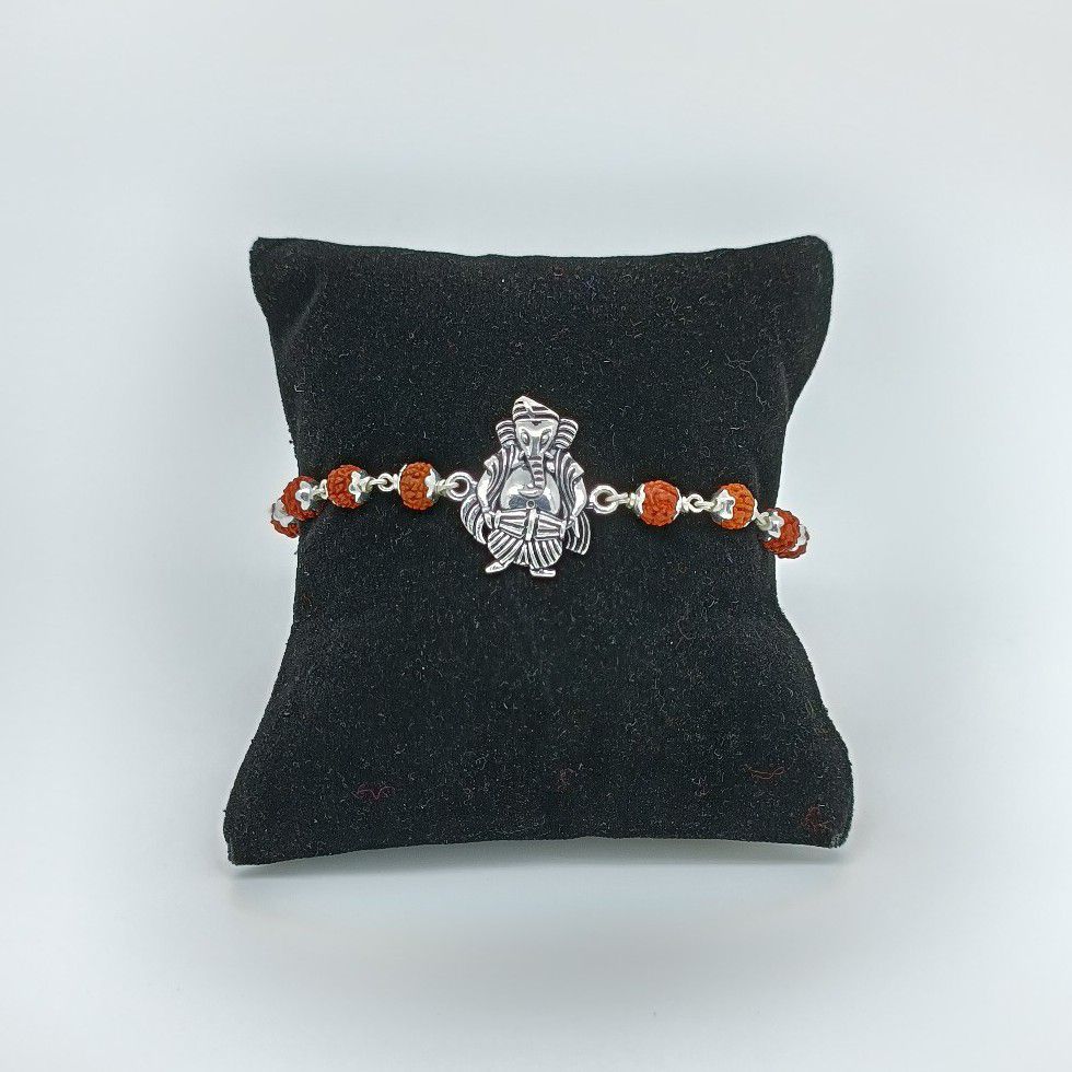 Ganesh Ji Design In Silver Rakhdi 800