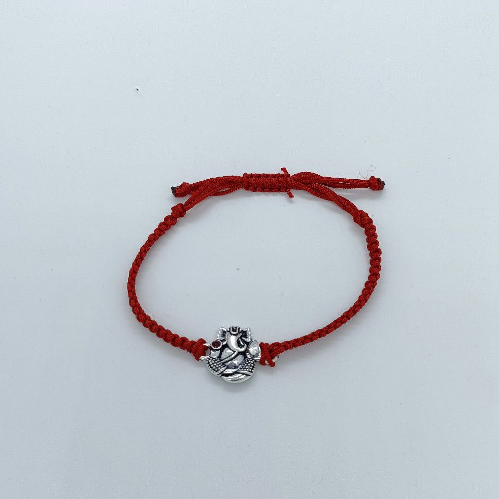 Ganesh ji design in silver rakhi