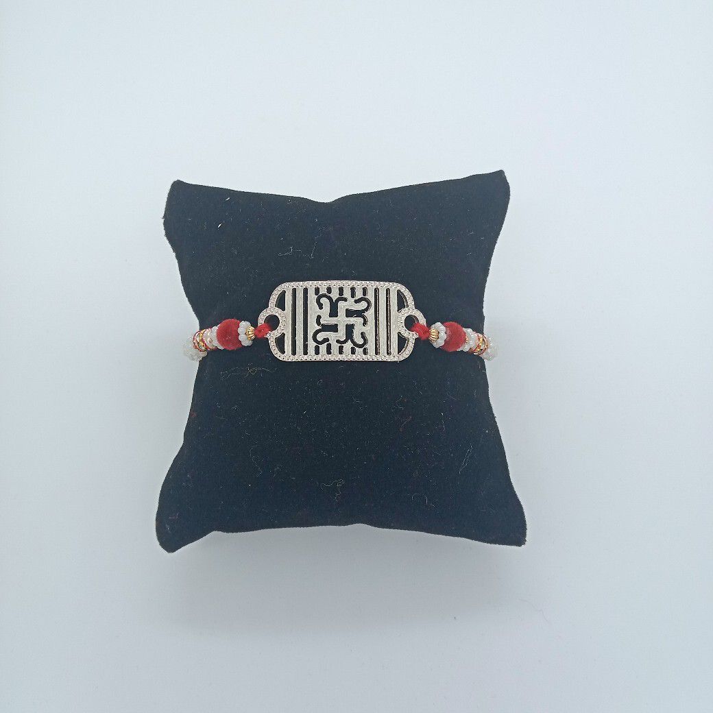 Silver swastik design  rakhi