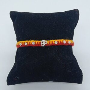 800 silver om design rakhi
