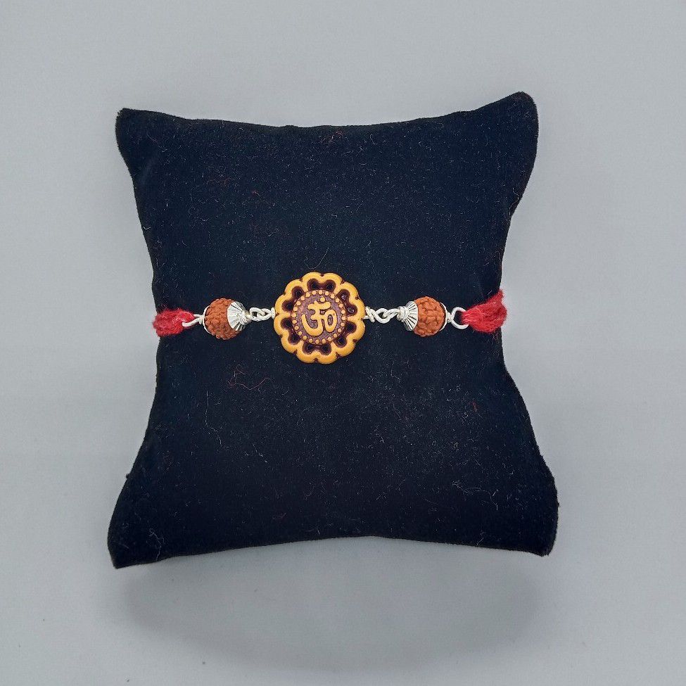 800 silver om design rakhi - Image 2