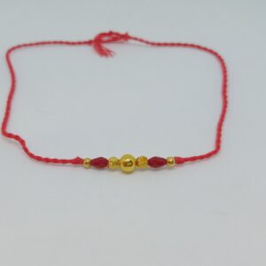 Gold plain Rakhi of pearls
