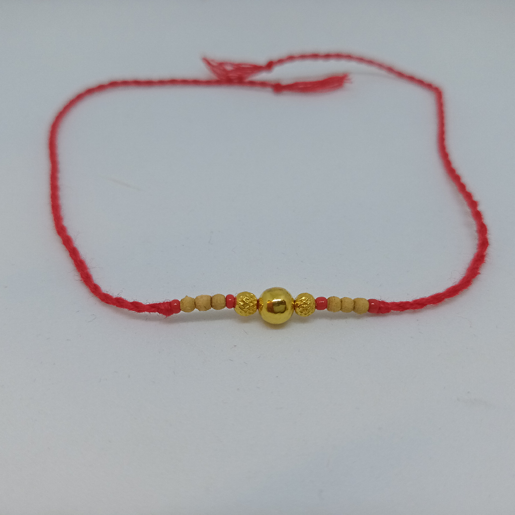 Gold simple rakhi Single Pearl